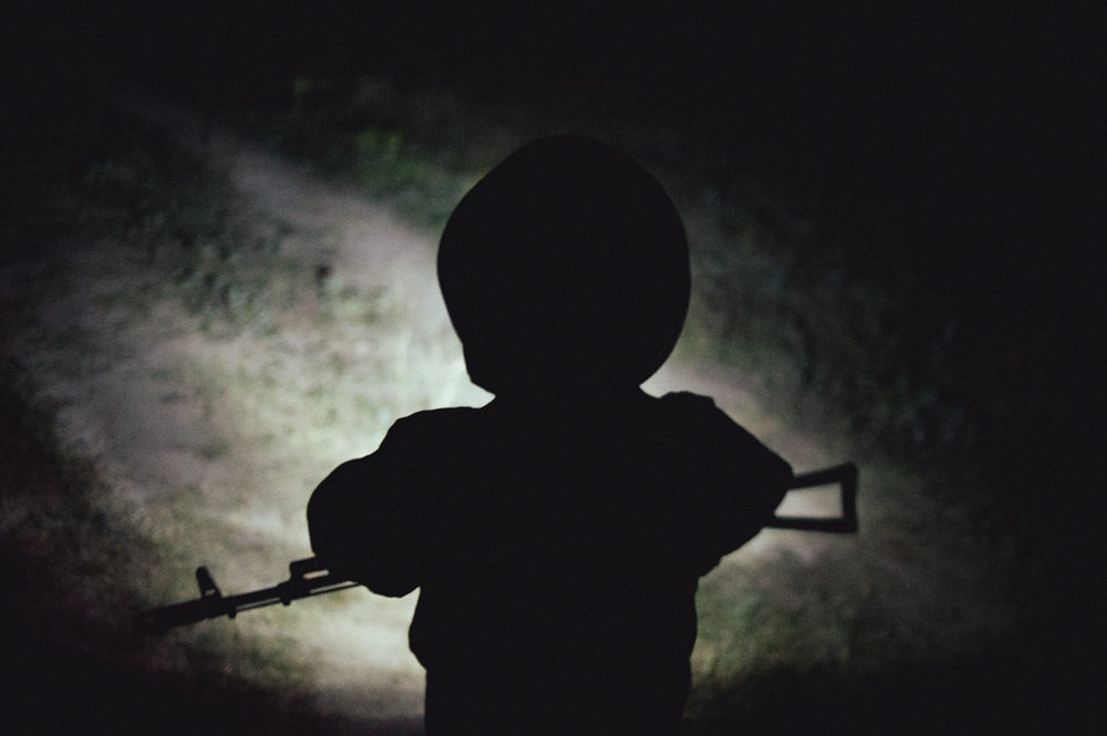 A boy  night patrolling to the camp Crimea-Sich.