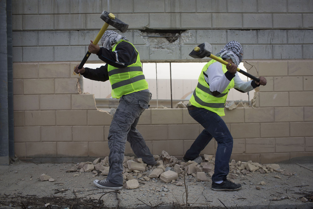 Activists Destroy a Section of the Separation Wall, Bir Nabala,